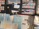 many different types of stamps on the table