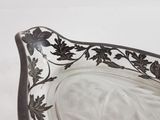 a glass bowl that has a black and white design on it