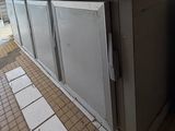 a refrigerator that is sitting in the middle of a kitchen