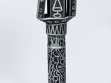 a black and white photo of a decorative object on a white background