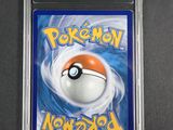 a close up of a pokemon card on a table
