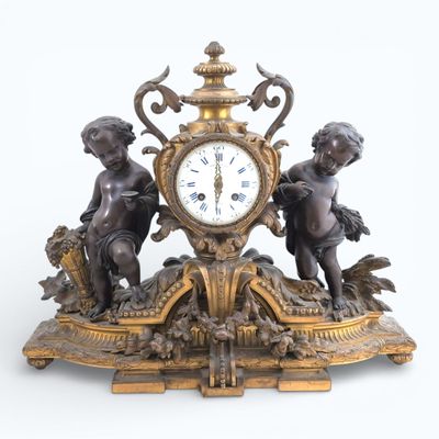 PENDULE de cheminée en bronze patiné et doré, figurant deux … - Photo 1