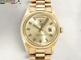 an image of a gold rolex watch with roman numerals