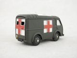 a toy truck with a red cross on the side