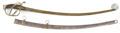 two old swords are displayed next to each other on a white surface