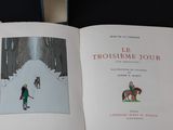 an open book with a picture of a person on a horse