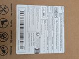 a cardboard box with a label on it that has a barcode on it