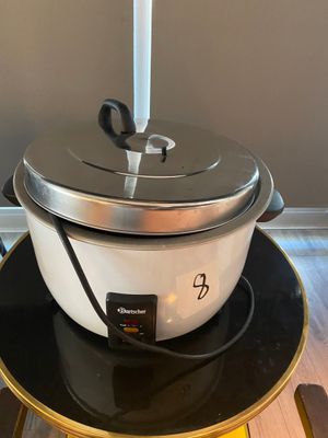 a crock pot sitting on top of a table