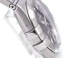 a close up of a watch on a white surface