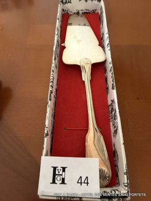 a box with a spoon and a fork inside of it