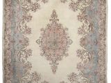 un ancien tapis persan à motif de médaillon