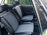 an image of a car with black seats in the back of it