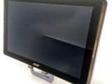 a tablet computer sitting on top of a stand