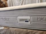 a close up of a mattress that is on a box