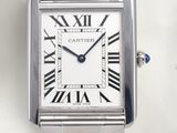 a silver watch with roman numerals on the face