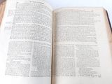 an open book that is sitting on a table