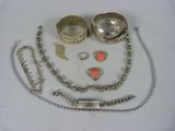 a lot of silver items that are on a table