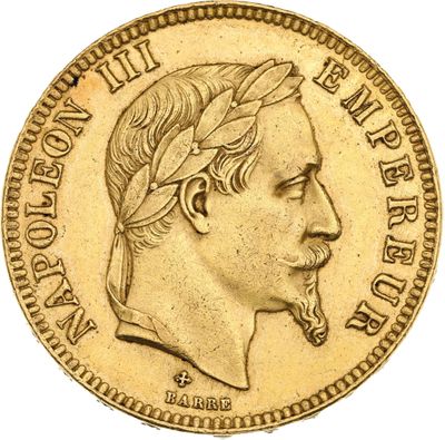gros plan d'une pièce d'or sur laquelle figure le visage d'un homme