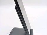a cell phone that is sitting on top of a stand