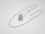 a close up of a necklace with a price tag on it