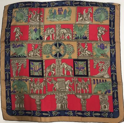 une image représentant une écharpe rouge, bleue et verte ornée d'éléphants