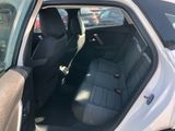 the back seat of a car with the door open