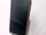 a cell phone that is sitting on top of a stand