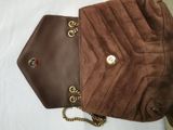 brown sued purse with chain strap and gold hardware