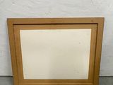 an old picture frame with a picture of a cat on it