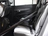 a car that has a seat belt in the back of it