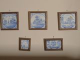 pictures hanging on the wall of a living room