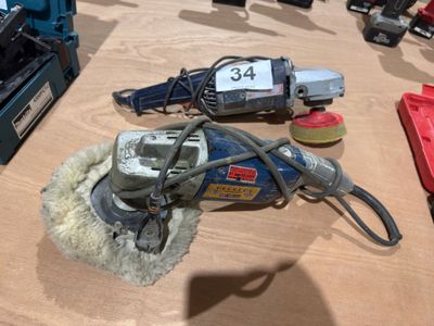a sander and other tools sitting on a table