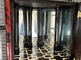 a fireplace with a mirror in the middle of it