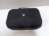 a black case sitting on a white table