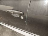 a close up of a door handle on a car