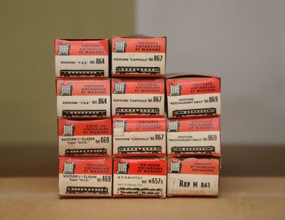 a stack of red boxes sitting on top of a table