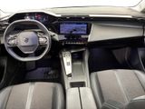 the interior of a car with a steering wheel, dashboard, and dash board