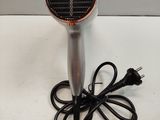 a hair dryer that is sitting on a table