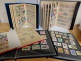 a lot of stamps on the pages of a book