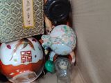 a box with many different items in it on the floor