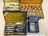 plusieurs types d'argenterie dans un coffret