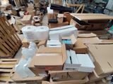 a lot of boxes and other items on the floor