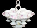 a white and pink bowl with a swan on it