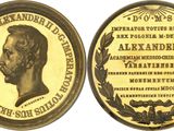 a gold coin with a portrait of a man on it