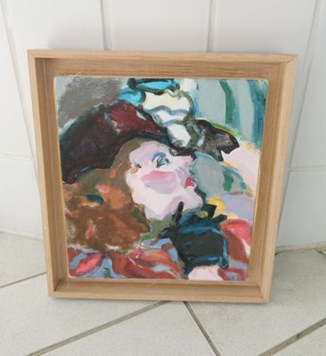 framed oil painting of a woman with a hat on her head