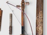 many different types of musical instruments displayed on a white surface