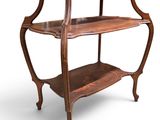 a wooden shelf with two shelves on top of it
