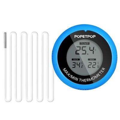 a clock that is next to a set of needles