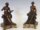 paire de figurines anciennes en bronze représentant une femme et un homme
