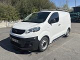 a white van that is parked in a parking lot